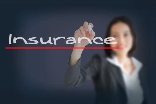 business woman writing insurance concept photo