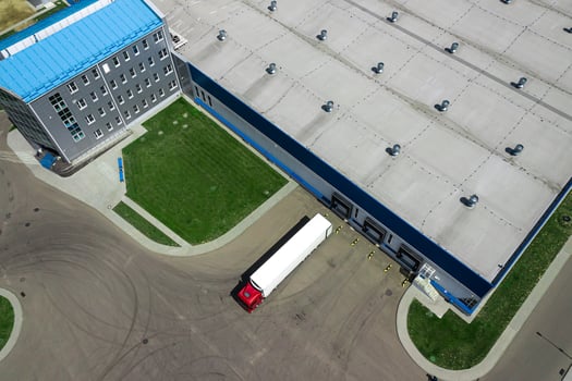 Aerial View of Loading Warehouse with Semi Truck. Aerial photo