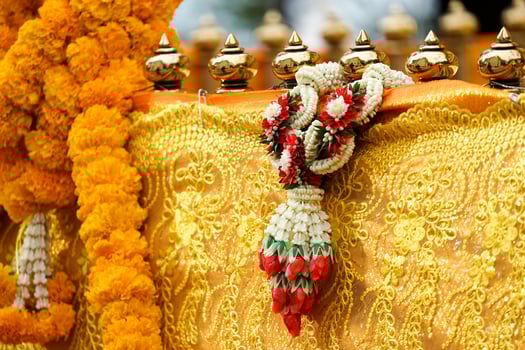 Thai garland on pagoda barricade photo