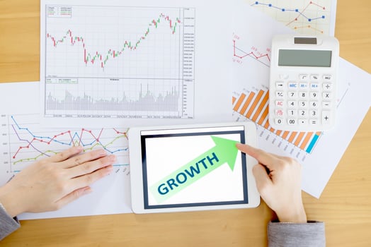 business, office, school and money concept - woman with chart paper, tablet pc and forex chart in it photo