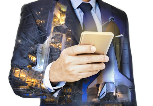 Double exposure of hand hold  smart phone with spaceport photo