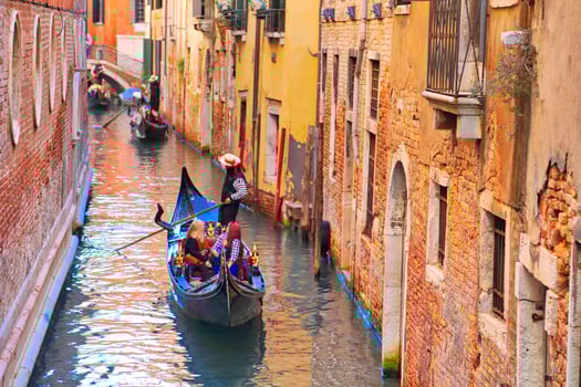 Luxury Gondola waiting for tourists near Rialto Bridge in Venice photo