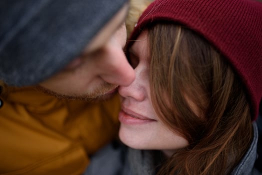 loving pregnant couple are walking outside the city in late autumn. photo