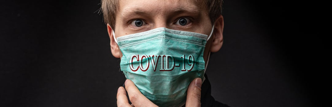 Man in a medical mask is suffocating. photo
