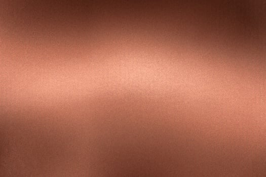 Glowing brushed dark red steel wall, abstract texture background photo