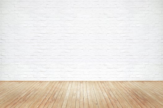 Vintage old brown wooden floor texture with white brick wall dust grime for background photo
