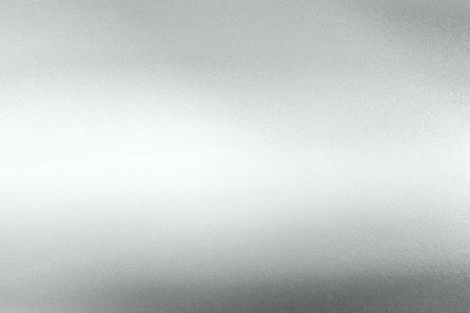 Glowing silver foil glitter paper sheet with copy space, abstract texture background photo