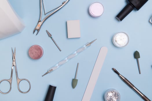 Tools and materials for manicure flat lay. Knolling nail care background photo