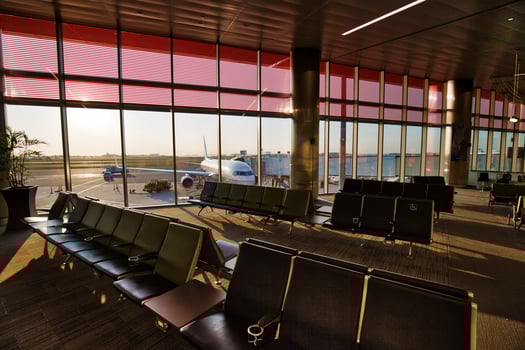 Logan Airport passenger waiting area for connecting flights between american cities at sunset photo