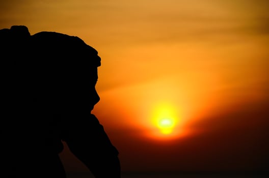 woman statue at sunrise photo