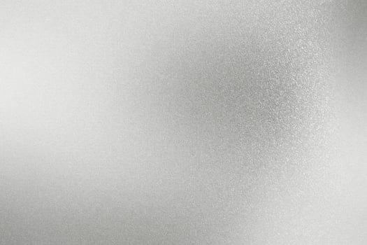 Shiny rough silver metal wall, abstract texture background photo