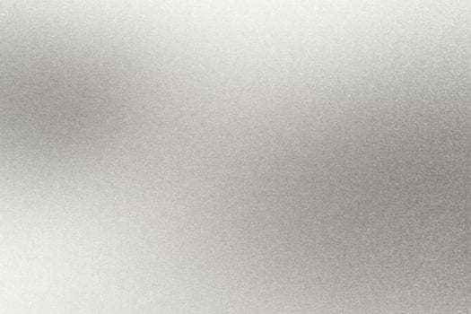 Abstract texture background, light shining on rough silver metal wall photo