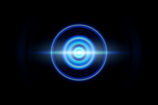 Abstract light effect with sound waves oscillating on black background photo