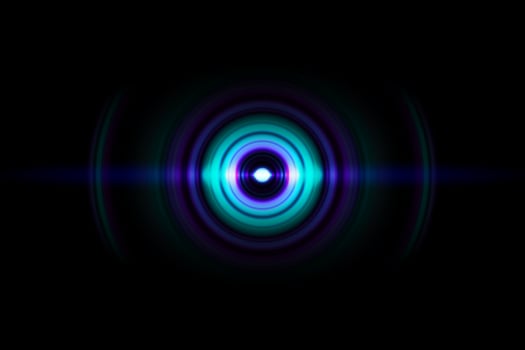 Abstract glowing circle blue light effect on black background photo