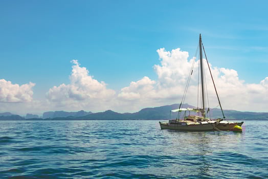 Sailboat in the sea in the sunlight background, luxury summer adventure, active vacation in Krabi,Thailand. photo