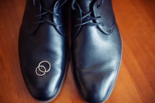 black men shoes and wedding rings photo