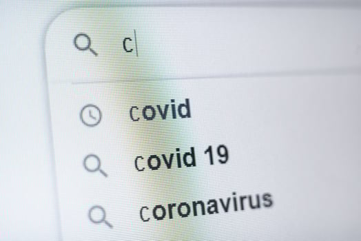 the inscription covid19 in the search bar on the monitor. photo