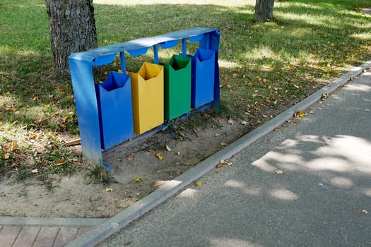 multi-colored containers for separate waste collection photo