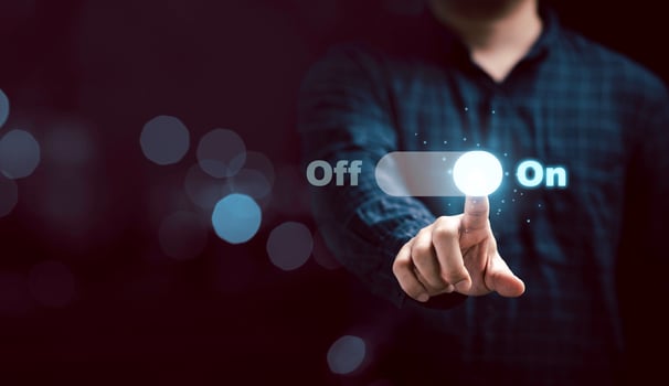Businessman touching to virtual toggle switch button for change from off to on. photo
