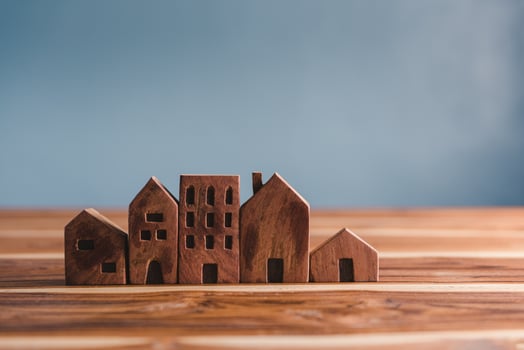Wooden House Community, Housing Market and Real Estate Development Concept. Business Home Insurance and Property Investment for Future Concepts. Mortgage House and Residential Loan photo