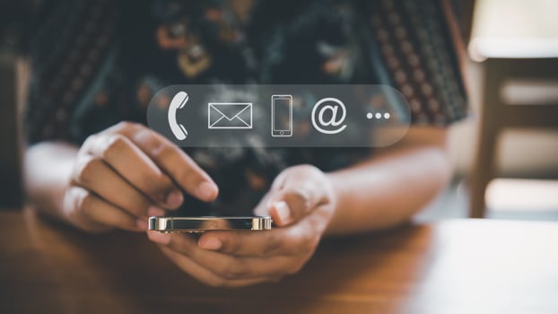 Contact Us Support Service and Information Connect Concept, Female's Hands is Using Mobile Phone and Laptop for Corporate Information Contact Via Email Support. Customer Communication Contact Services photo