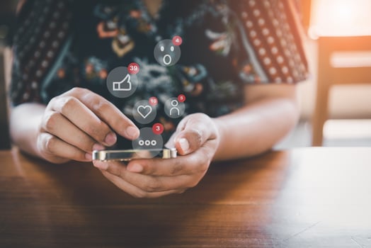 Social Media and Technology Internet Communication Connection Concept. Business Woman's Hands is Using Social Media Via Smartphone With Notification Icon. Technology Digital Media Mobile Phone Network photo