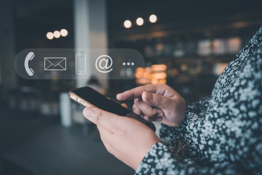 Contact Us Support Service and Information Connect Concept, Female's Hands is Using Mobile Phone and Laptop for Corporate Information Contact Via Email Support. Customer Communication Contact Services photo