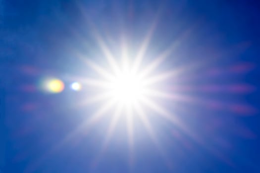 Sun and blue sky photo