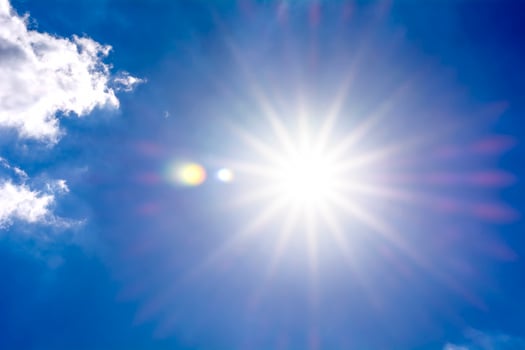 Sun and blue sky photo