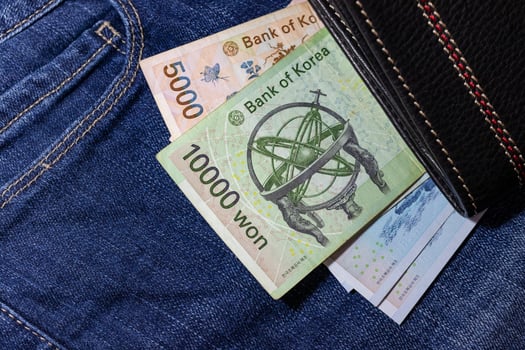 Korean money, Korea Banknote, Korean won on Jean Background. photo