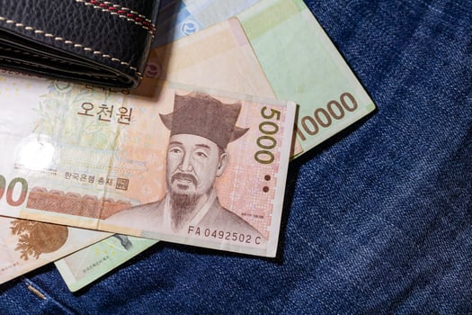 Korean money, Korea Banknote, Korean won on Jean Background. photo