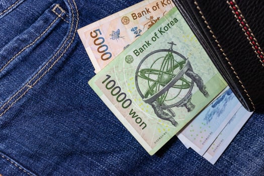 Korean money, Korea Banknote, Korean won on Jean Background. photo