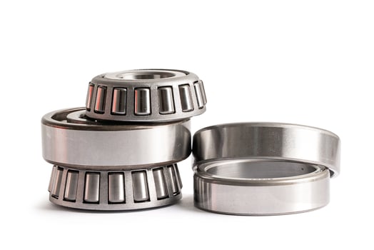 Ball bearing stainless metal roller for machine industrial, angular contact isolated on white background with clipping path. photo