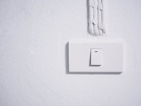 light switch on wall. photo