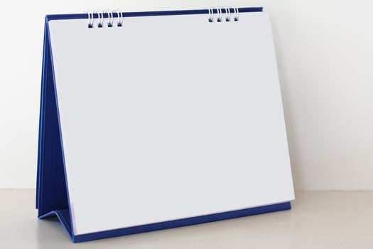 Blank paper desk spiral calendar photo