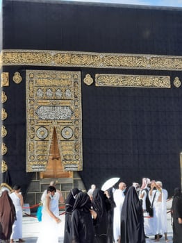 Makkah, Saudi Arabia, 2021 -  Visitors from all over the world are performing Tawaf in the Masjid al-Haram in Makkah. photo