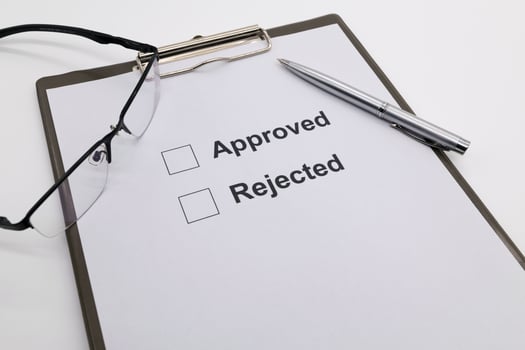 pen over document, select Approved or Rejected. photo