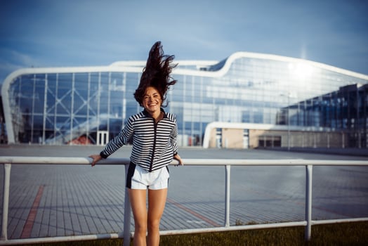 young carefree woman jumping photo