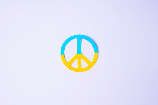 Support for Ukraine in the war with Russia, symbol of peace with flag of Ukraine. Pray, No war, stop war, stand with Ukraine and Nuclear Disarmament photo