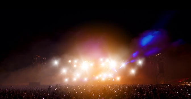 Silhouette concert in front of stage photo
