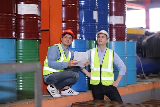 Industry worker Foreman or worker work at factory site check up machine or products in site. Engineer or Technician checking Material or Machine on Plant. Industrial and Factory. photo