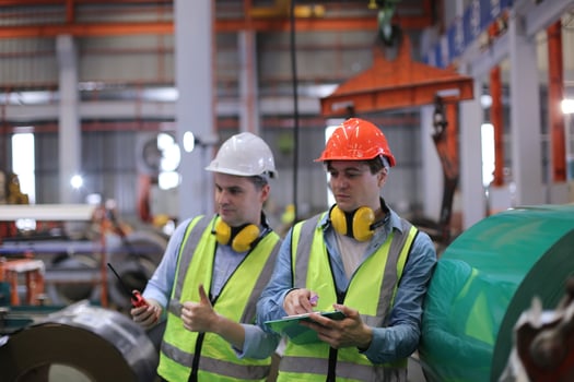 Industry worker Foreman or worker work at factory site check up machine or products in site. Engineer or Technician checking Material or Machine on Plant. Industrial and Factory. photo