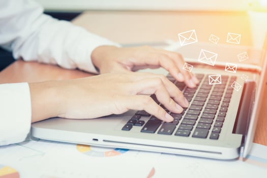 Closeup of businesswoman hand typing on laptop keyboard photo