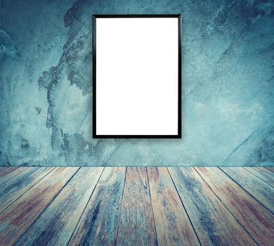 blank poster photo frame on cement wall