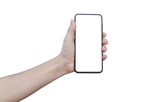 hand holding black smart phone white screen mockup, Isolated on black background with clipping path. photo
