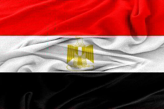 Fabric wavy texture national flag of egypt. photo