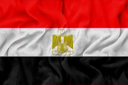 Fabric wavy texture national flag of egypt. photo