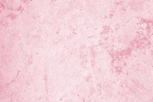 Vintage of light pink plaster texture background. Abstract painted cement wall surface. photo