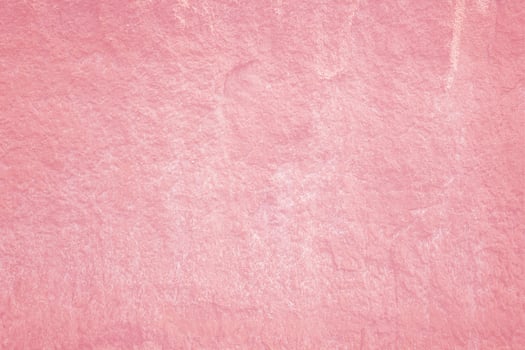 Vintage of light pink plaster texture background. Abstract painted cement wall surface. photo