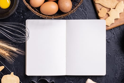 Making cookies cookbook recipe design concept, baking ingredients preparation layout with notebook, top view, flat lay, overhead, mockup copy space. photo